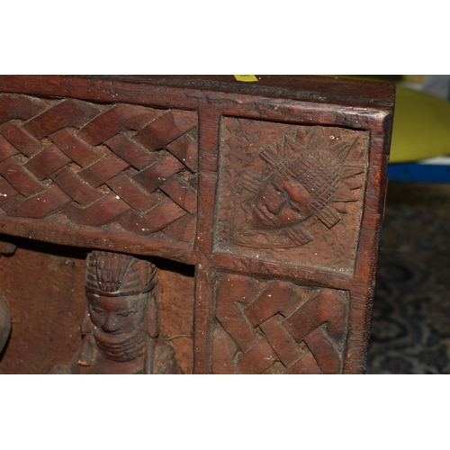 564 - ONE BOX OF LOOSE AFRICAN/TRIBAL SOUVENIRS to include two wooden masks, a wooden plaque, three metal ... 