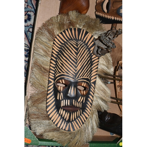 564 - ONE BOX OF LOOSE AFRICAN/TRIBAL SOUVENIRS to include two wooden masks, a wooden plaque, three metal ... 