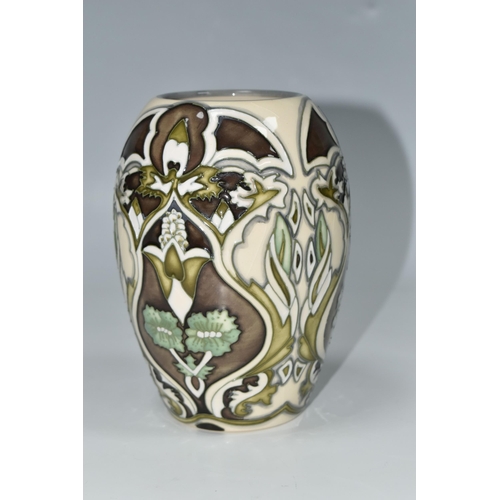 323 - A MOORCROFT POTTERY LIMITED EDITION COLLECTORS CLUB VASE, the 2004 vase tube lined in the in the Bur... 