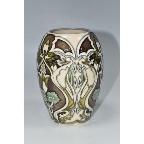 323 - A MOORCROFT POTTERY LIMITED EDITION COLLECTORS CLUB VASE, the 2004 vase tube lined in the in the Bur... 