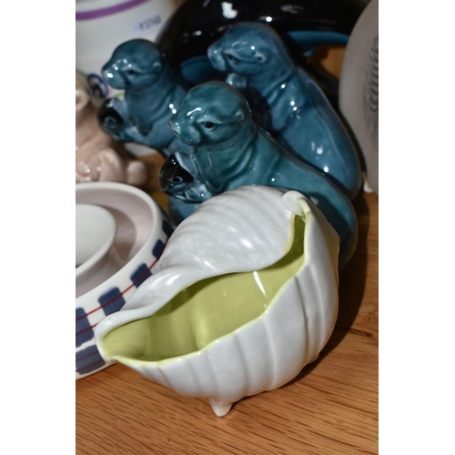 338 - A GROUP OF POOLE POTTERY, to include two Freeform posy vases, a Twin tone seashell in Lime Yellow (g... 