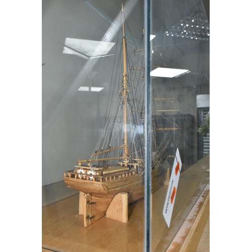 343 - A WOODEN REPLICA OF THE NORWEGIAN SHIP BRIGANTINE LEON IN A GLASS DISPLAY CASE, crafted in 2009 by B... 