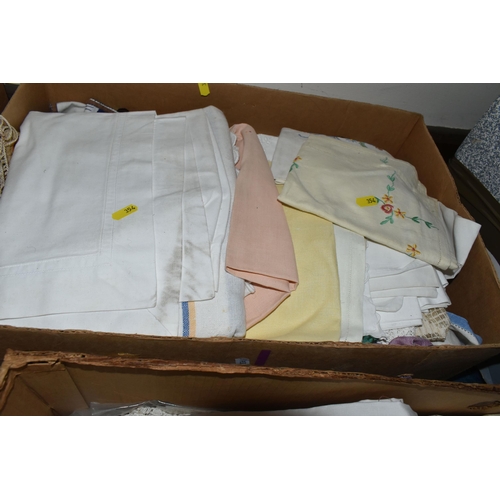 354 - FOUR BOXES OF LINEN AND TEXTILES, ONE RUG, AND LOOSE EMBROIDERY SUPPLIES to include a large quantity... 