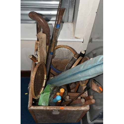 368 - ONE BOX OF VINTAGE SPORTS EQUIPMENT to include three hockey sticks, a wooden cricket set and a plast... 