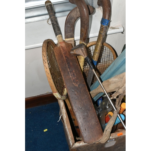 368 - ONE BOX OF VINTAGE SPORTS EQUIPMENT to include three hockey sticks, a wooden cricket set and a plast... 