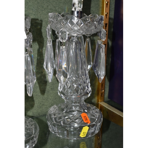 371 - A PAIR OF 20TH CENTURY CLEAR GLASS LUSTRE CANDLESTICKS AND TWO LATE 19TH CENTURY GLASS LUSTRES, the ... 