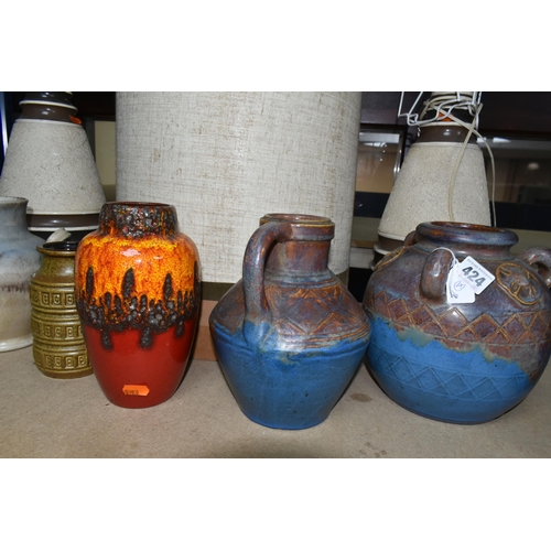 424 - A GROUP OF MID-CENTURY STUDIO POTTERY VASES AND A PAIR OF TABLE LAMPS, comprising a pair of large cr... 