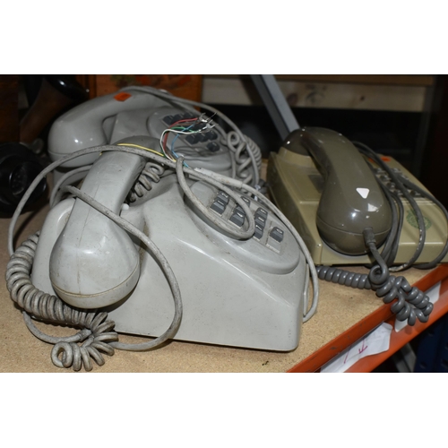 431 - A GROUP OF FIVE VINTAGE TELEPHONES, to include two wooden cased wall telephones and two pale grey pu... 