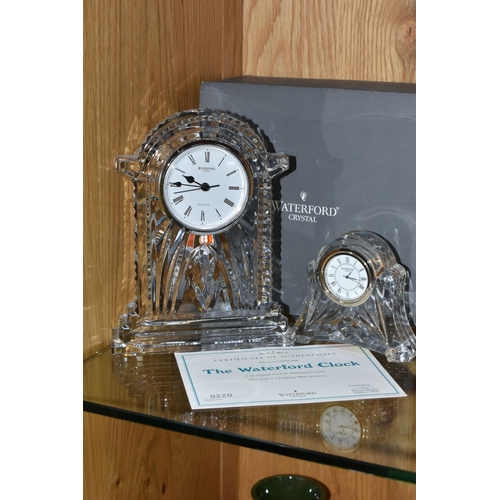 438 - TWO WATERFORD CRYSTAL CLOCKS, heights 18cm and 9cm, with a certificate for 'The Waterford Clock' by ... 