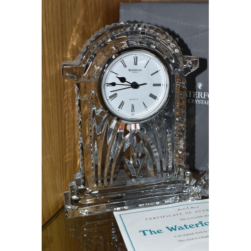 438 - TWO WATERFORD CRYSTAL CLOCKS, heights 18cm and 9cm, with a certificate for 'The Waterford Clock' by ... 