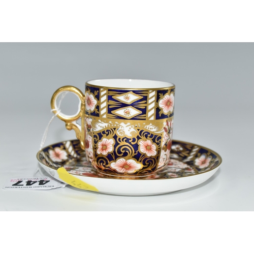 447 - A ROYAL CROWN DERBY IMARI 2451 COFFEE CAN AND SAUCER, bearing red printed backstamps and date cypher... 