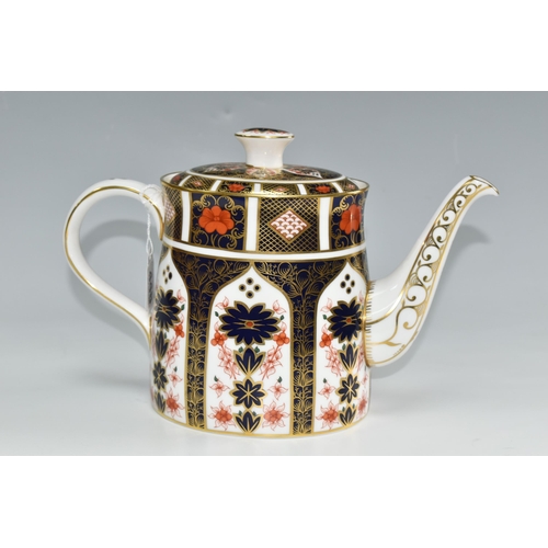 448 - A ROYAL CROWN DERBY IMARI 1128 TEAPOT, and cover, of oval form, bearing red printed backstamps and d... 