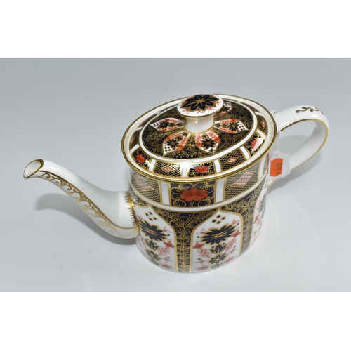 448 - A ROYAL CROWN DERBY IMARI 1128 TEAPOT, and cover, of oval form, bearing red printed backstamps and d... 