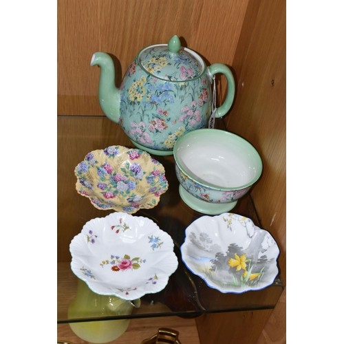 450 - A GROUP OF SHELLEY TEAWARE, comprising a Melody pattern teapot (restored chip on inner rim, crazing,... 