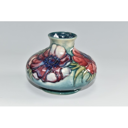 453 - A MOORCROFT POTTERY 'ANEMONE' VASE, the squat vase tube lined with purple and pink anemone flowers o... 