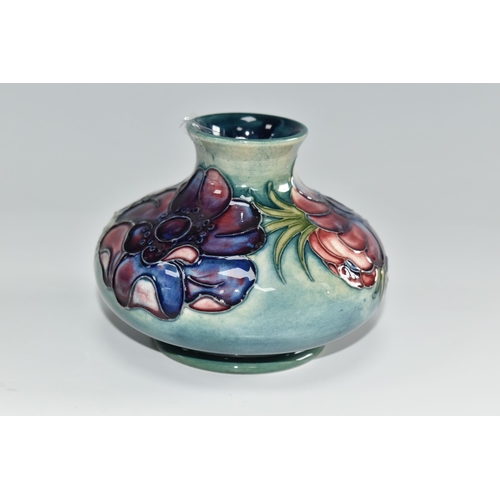 453 - A MOORCROFT POTTERY 'ANEMONE' VASE, the squat vase tube lined with purple and pink anemone flowers o... 