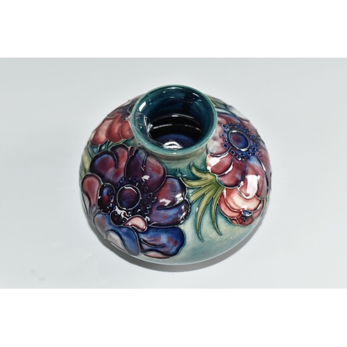 453 - A MOORCROFT POTTERY 'ANEMONE' VASE, the squat vase tube lined with purple and pink anemone flowers o... 