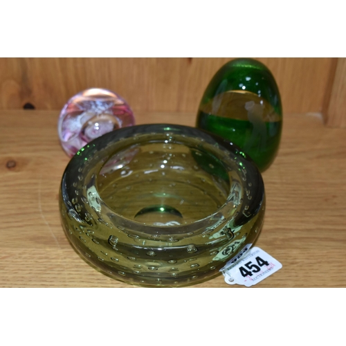 454 - A WHITEFRIARS BOWL AND TWO CAITHNESS PAPERWEIGHTS, the green Whitefriars bowl with controlled bubble... 