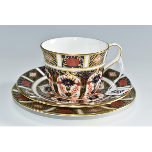 458 - A ROYAL CROWN DERBY OLD IMARI 1128 TRIO, comprising teacup, saucer and tea plate, with red printed b... 