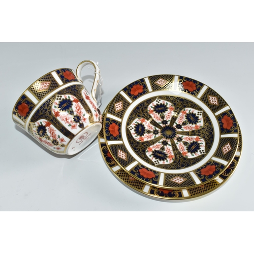 458 - A ROYAL CROWN DERBY OLD IMARI 1128 TRIO, comprising teacup, saucer and tea plate, with red printed b... 