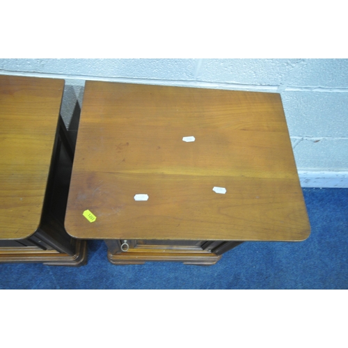 1201 - AN OPPOSING PAIR OF BRIGITTE FORESTIER CHERRYWOOD BEDSIDE CABINETS, fitted with a single drawer and ... 