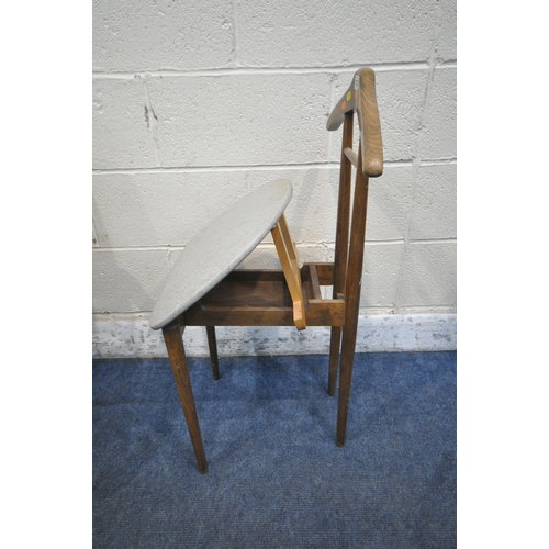 1216 - A MID CENTURY TEAK VALET CHAIR, with a hinged seat, raised on cylindrical tapered legs, along with a... 