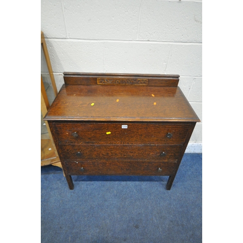 1218 - AN EARLY 20TH CENTURY OAK CHEST OF THREE LONG DRAWERS, with a raised back, width 88cm x depth 45cm x... 