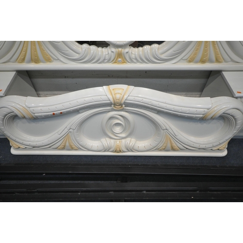 1234 - A CREAM ITALIAN 5FT BEDSTEAD, with flamboyant decorations, side rails, bespoke slats, along with a p... 