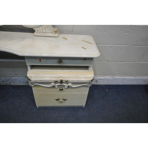 1238 - A PAIR OF ITALIAN CREAM TWO DRAWER BEDSIDE CHESTS, with a matching dressing table top resting on eac... 