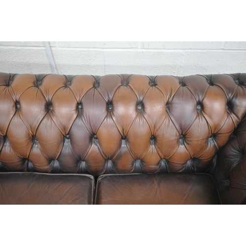 1251 - A BROWN LEATHER UPHOLSTERED TWO SEATER CHESTERFIELD SOFA, length 163cm x depth 84cm x height 70cm (c... 