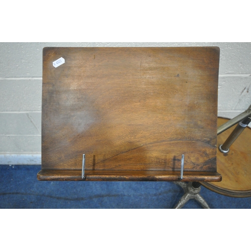 1264 - A REPRODUCTION MUSIC STAND, the tubular metal support holding an articulated arm and a fixed circula... 