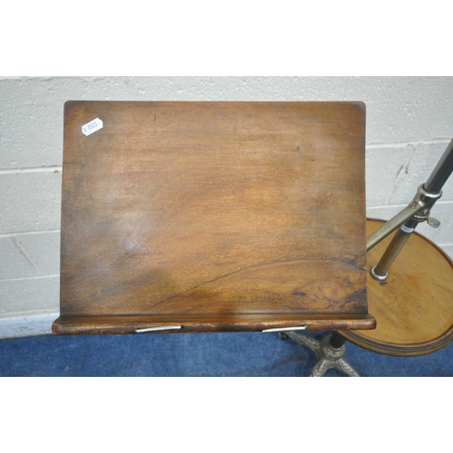 1264 - A REPRODUCTION MUSIC STAND, the tubular metal support holding an articulated arm and a fixed circula... 