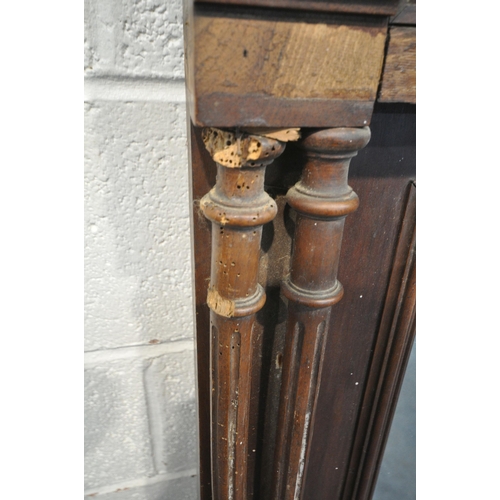 1272 - A 20TH CENTURY OAK OVERMANTEL MIRROR, with various carved details, turned and fluted supports, width... 