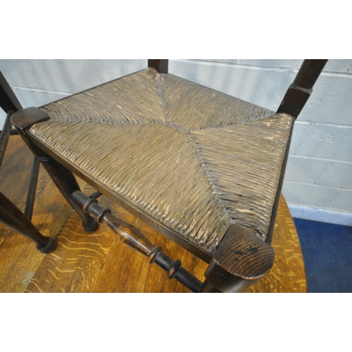 1296 - AN EARLY 20TH CENTURY OAK DROP LEAF TABLE, open width 151cm x closed with 54cm x depth 92cm x height... 