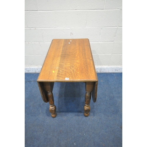 1296 - AN EARLY 20TH CENTURY OAK DROP LEAF TABLE, open width 151cm x closed with 54cm x depth 92cm x height... 