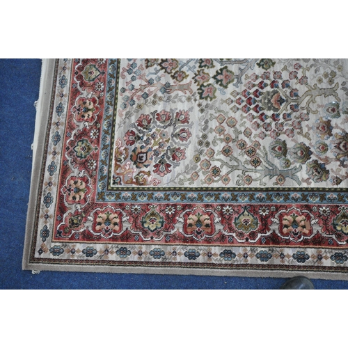 1317 - FIRTH CARPETS LTD, A LARGE RECTANGULAR BUCKINGHAM KIRMAN RUG, with a cream field, central medallion ... 