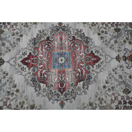 1317 - FIRTH CARPETS LTD, A LARGE RECTANGULAR BUCKINGHAM KIRMAN RUG, with a cream field, central medallion ... 