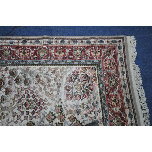 1317 - FIRTH CARPETS LTD, A LARGE RECTANGULAR BUCKINGHAM KIRMAN RUG, with a cream field, central medallion ... 