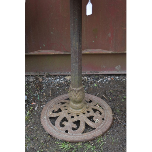 1004 - A WEATHERED CAST IRON BIRD BATH, with three birds to the top edge, on a single support and circular ... 