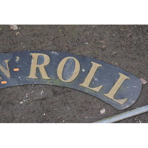 1009 - AN ARCHED METAL SIGN, READING ROCK 'N' ROLL, width 127cm, and another metal sign reading ELVIS 1935-... 