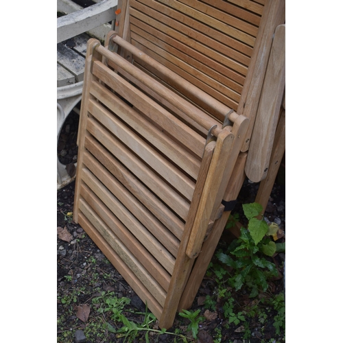 1019 - A PAIR OF TEAK FOLDING SUN LOUNGERS, with loose footrests (condition report: some weathering, but ap... 