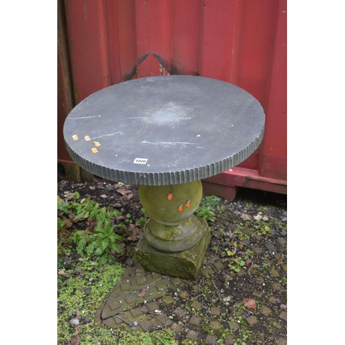 1020 - A SLATE TOP GARDEN TABLE, on a composite base, diameter 57cm x height 55cm, along with a weathered c... 