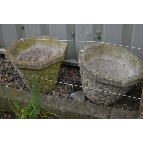 1021 - A PAIR OF COMPOSITE OCTAGONAL BRICK EFFECT PLANTERS, along with a square planter and a water trough ... 