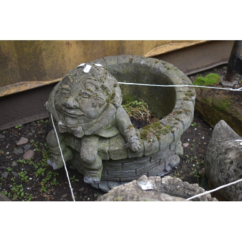 1027 - A SELECTION OF WEATHERED COMPOSITE GARDEN ORNAMENTS, to include a Humpty Dumpty planter, a basket st... 