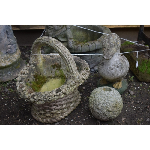 1027 - A SELECTION OF WEATHERED COMPOSITE GARDEN ORNAMENTS, to include a Humpty Dumpty planter, a basket st... 