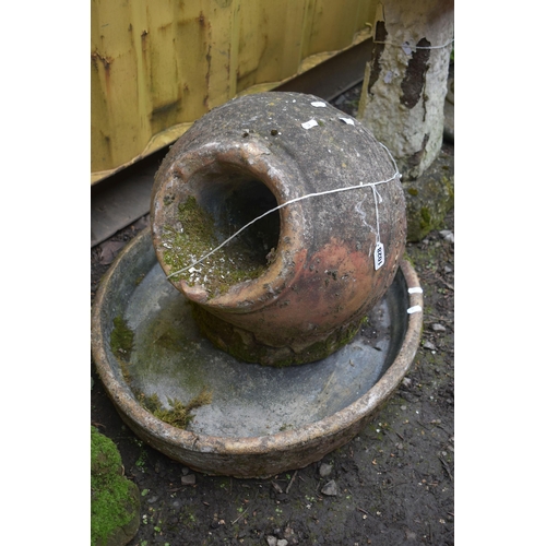 1028 - A COMPOSITE GARDEN FEATURE, of a urn within an oval bowl (condition report: weathered, some chips)