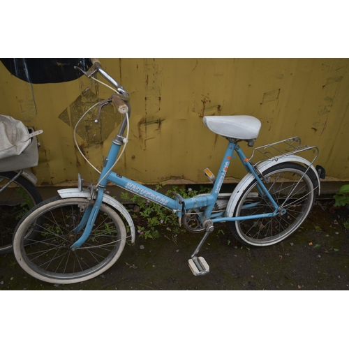 1032 - A VINTAGE FOLDING BICYCLE, along with universal folding bicycle (condition report: universal bike no... 