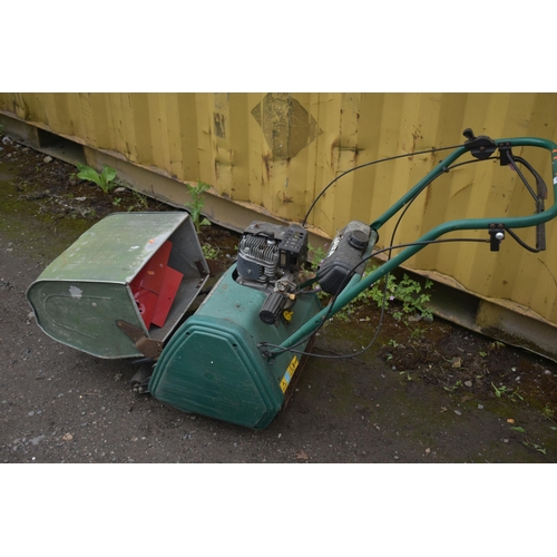 1035 - A QUALCAST CLASSIC PETROL 35s CYLINDER LAWNMOWER, with an odd grassbox and aerator (condition report... 