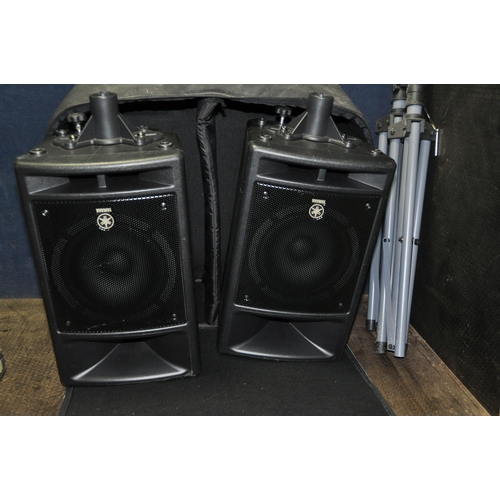 1060 - TWO YAMAHA STAGEPAS 300 PORTABLE SPEAKER SYSTEMS including two powered speaker, two passive speakers... 