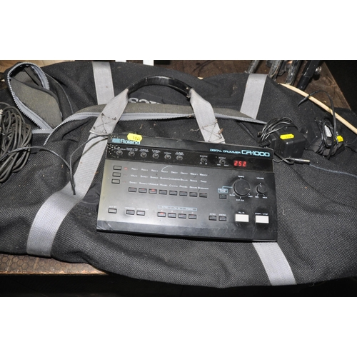 1061 - A BAG CONTAINING SOUND AND LIGHTING EQUIPMENT including a Roland CR1000 digital drummer, a Keltron S... 